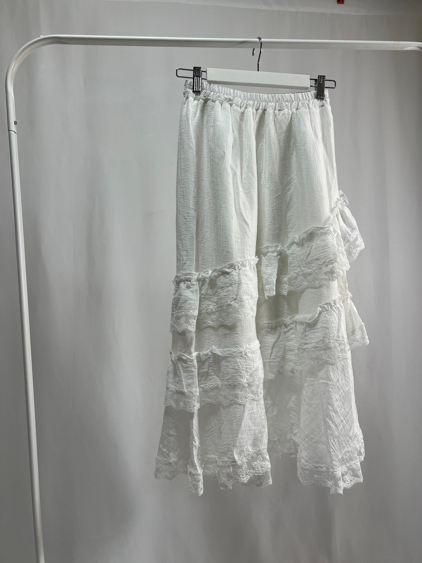 25000011White Lace Skirt – Midi Length