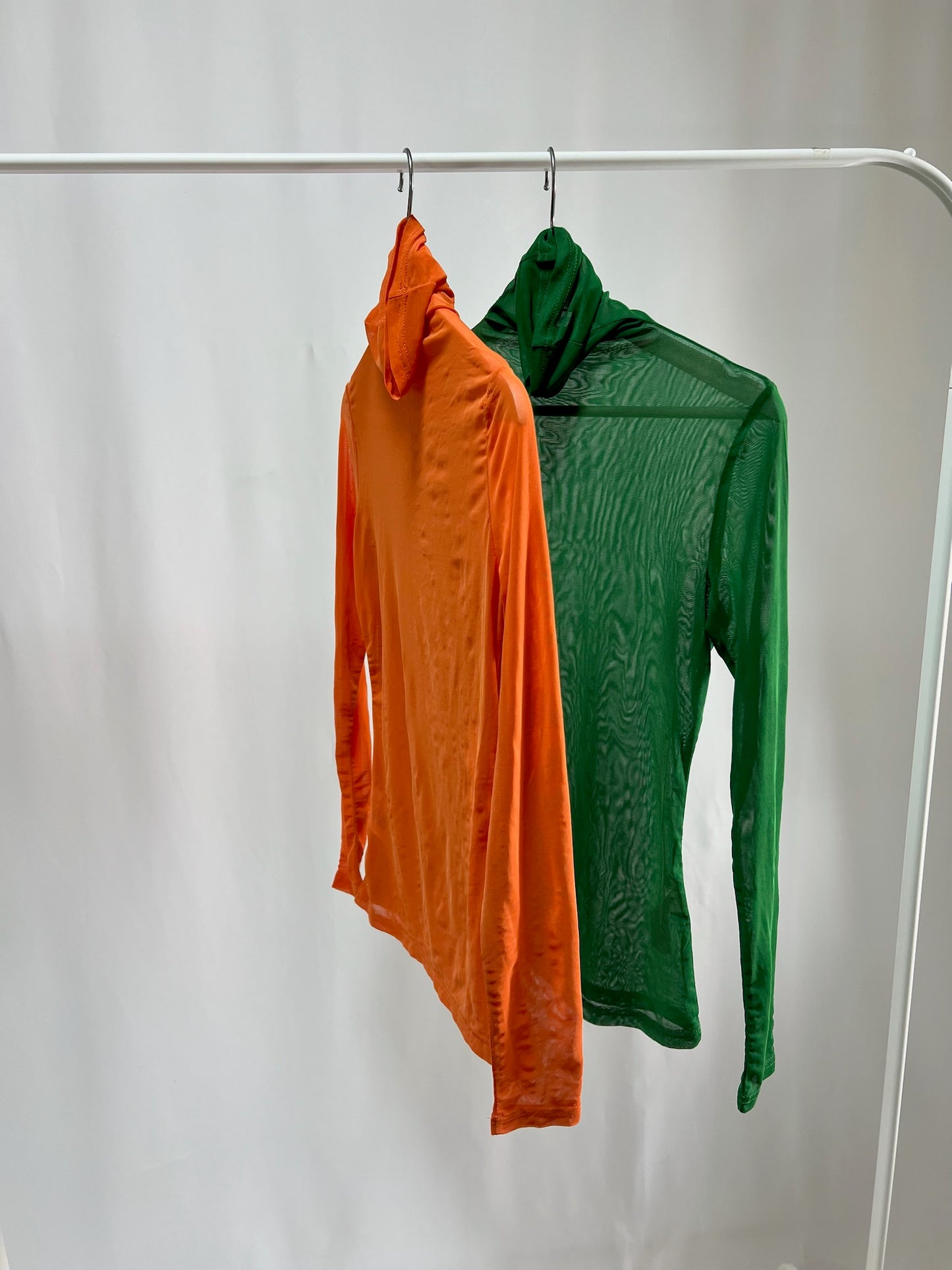 25028.29Sheer Turtleneck Color Top