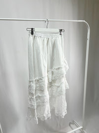 25000011White Lace Skirt – Midi Length