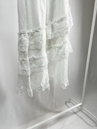 25000011White Lace Skirt – Midi Length