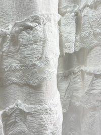 25000011White Lace Skirt – Midi Length