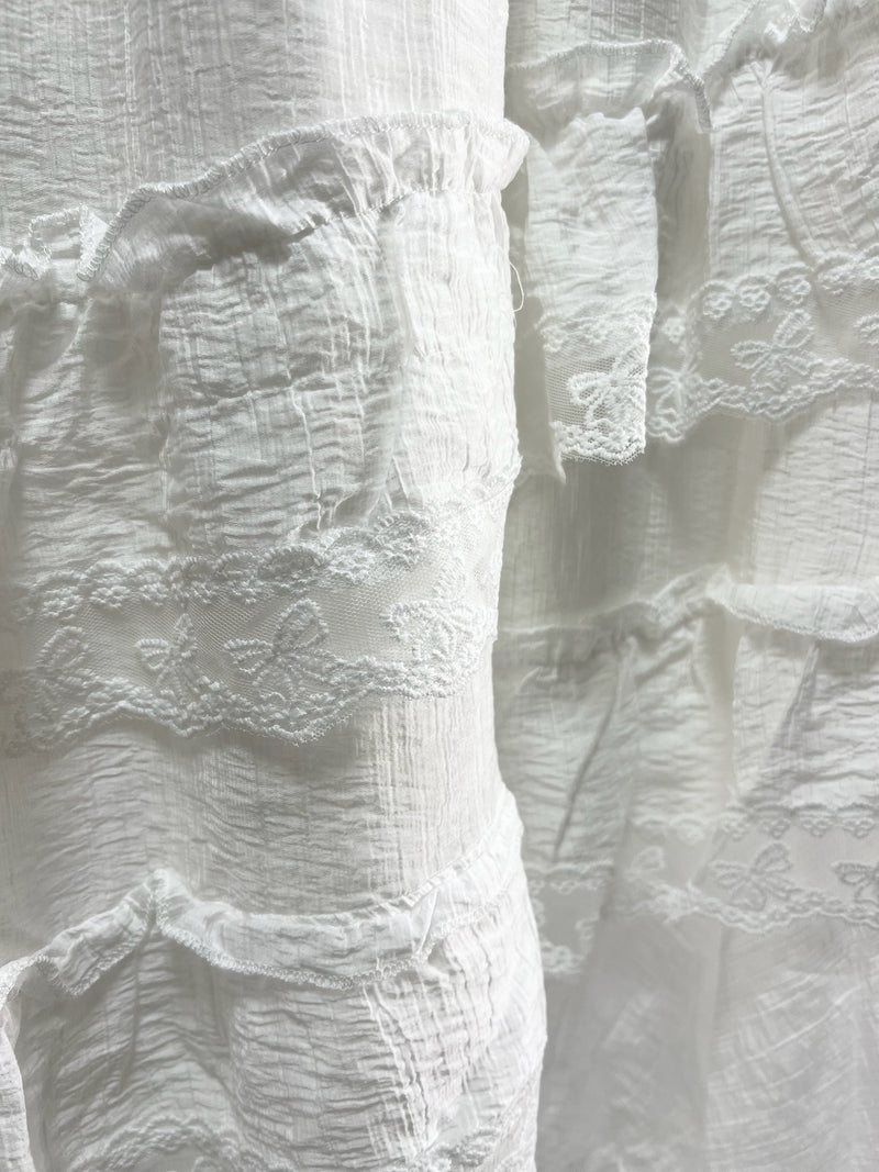 25000011White Lace Skirt – Midi Length