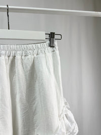 25000011White Lace Skirt – Midi Length