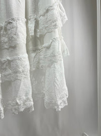 25000011White Lace Skirt – Midi Length