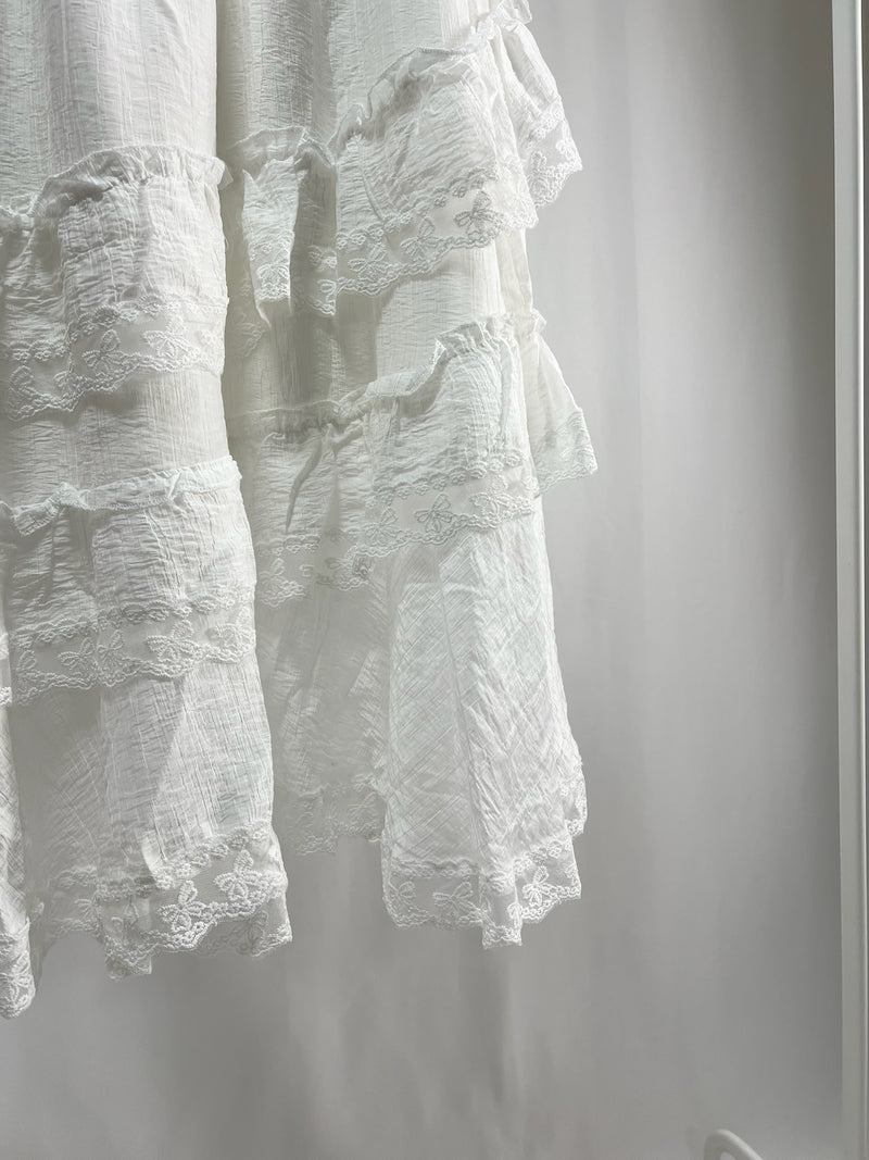 25000011White Lace Skirt – Midi Length
