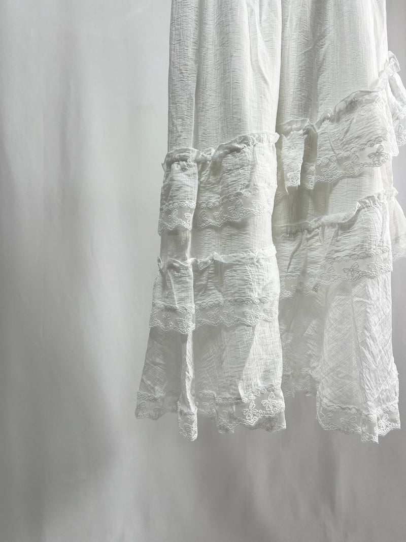 25000011White Lace Skirt – Midi Length