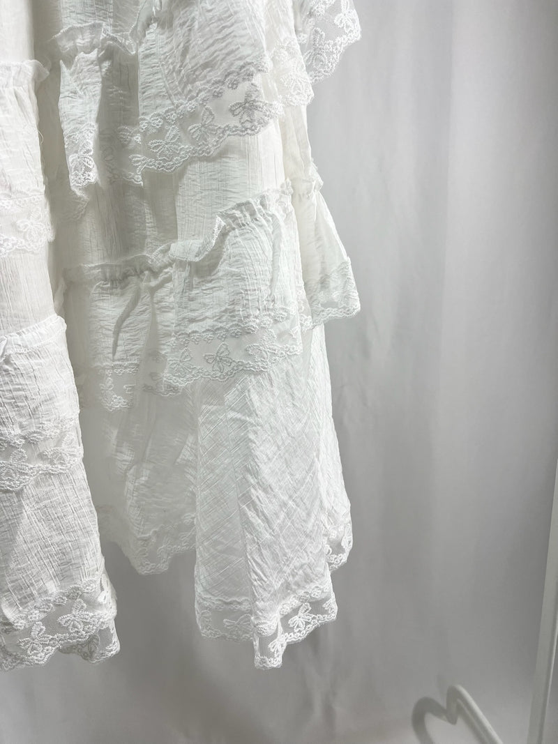 25000011White Lace Skirt – Midi Length