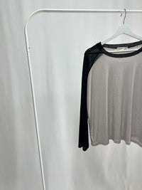 25066Sheer Raglan Top with Flared Sleeves