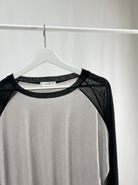 25066Sheer Raglan Top with Flared Sleeves