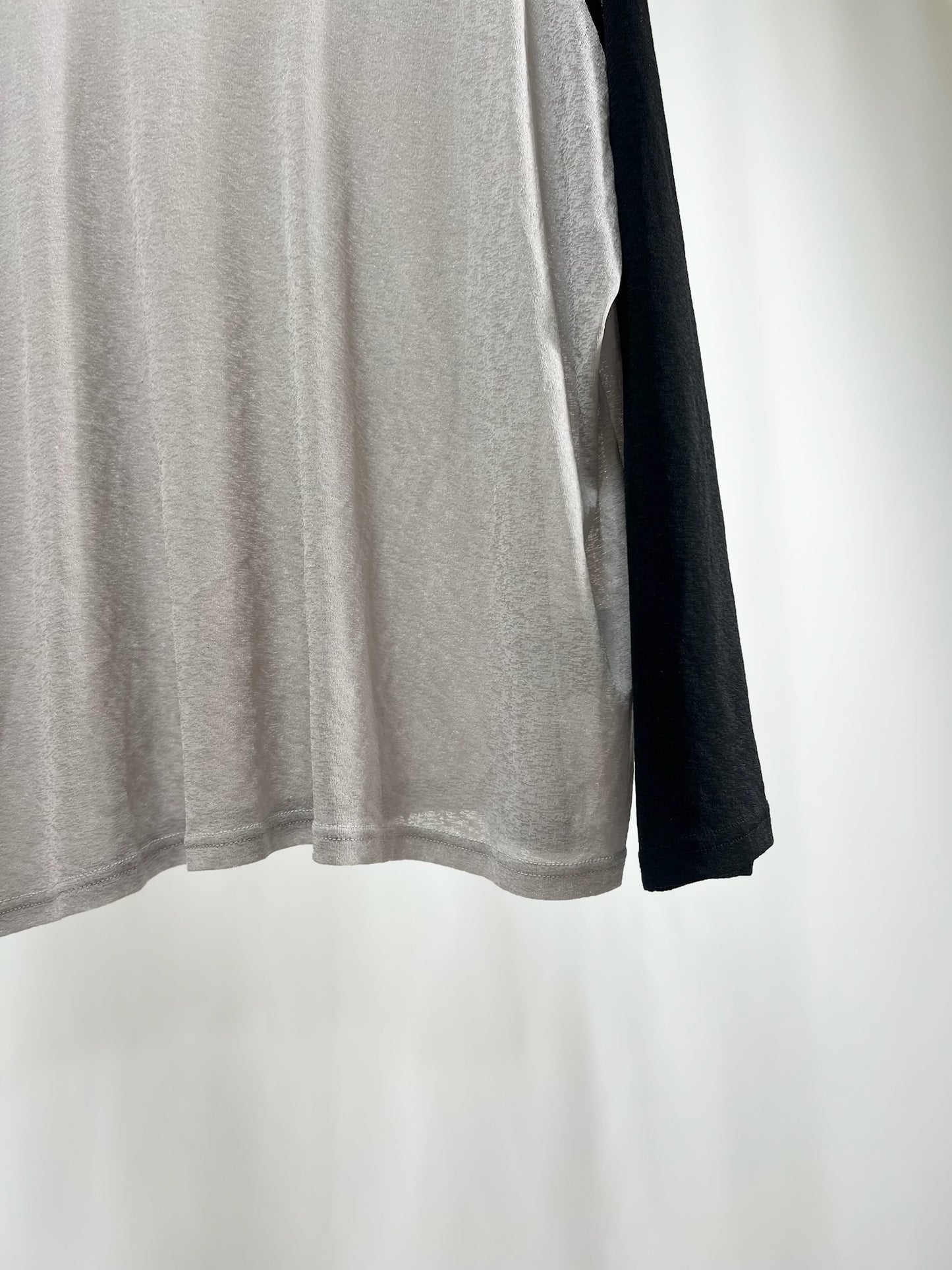 25066Sheer Raglan Top with Flared Sleeves