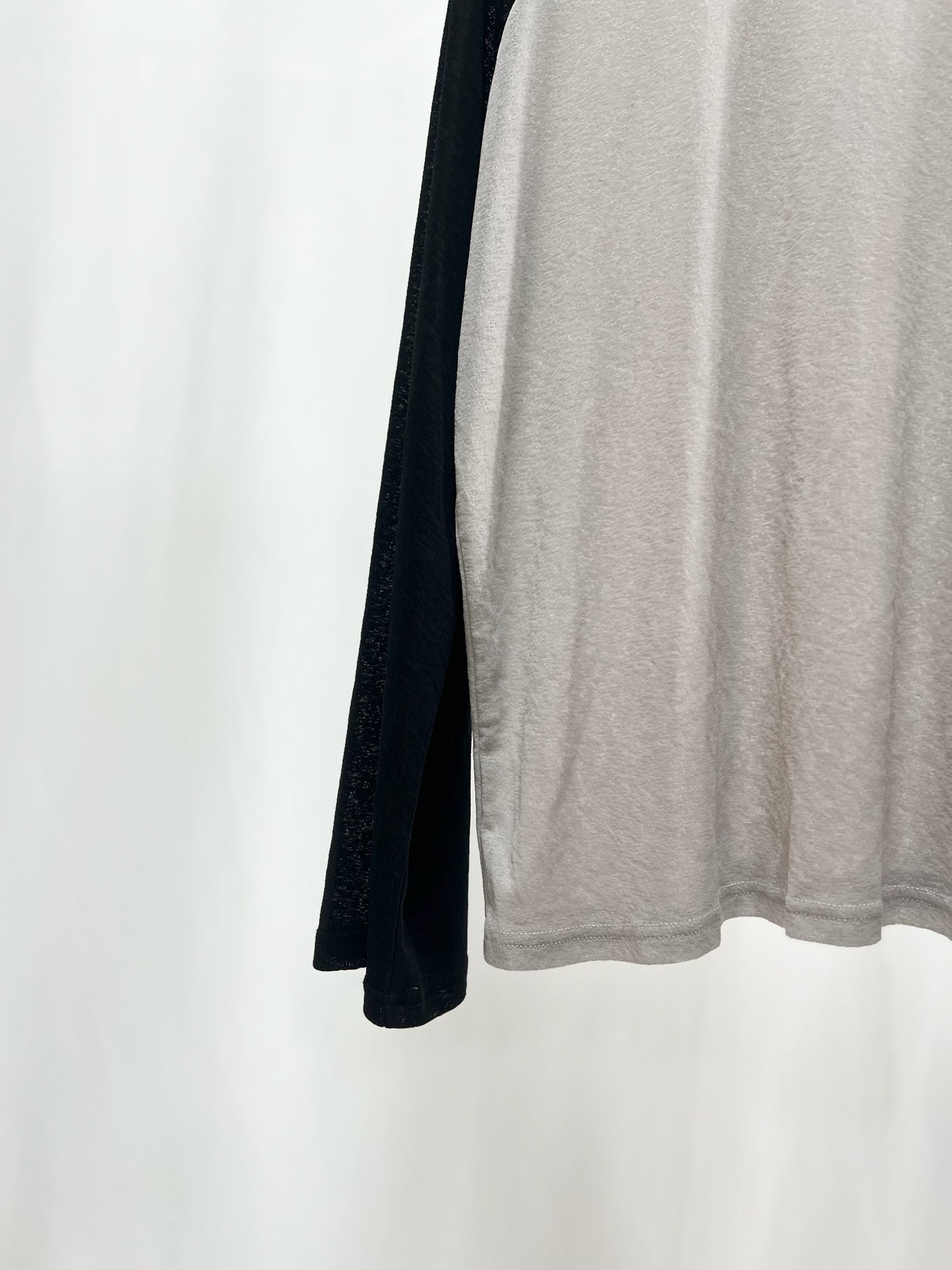 25066Sheer Raglan Top with Flared Sleeves