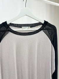 25066Sheer Raglan Top with Flared Sleeves