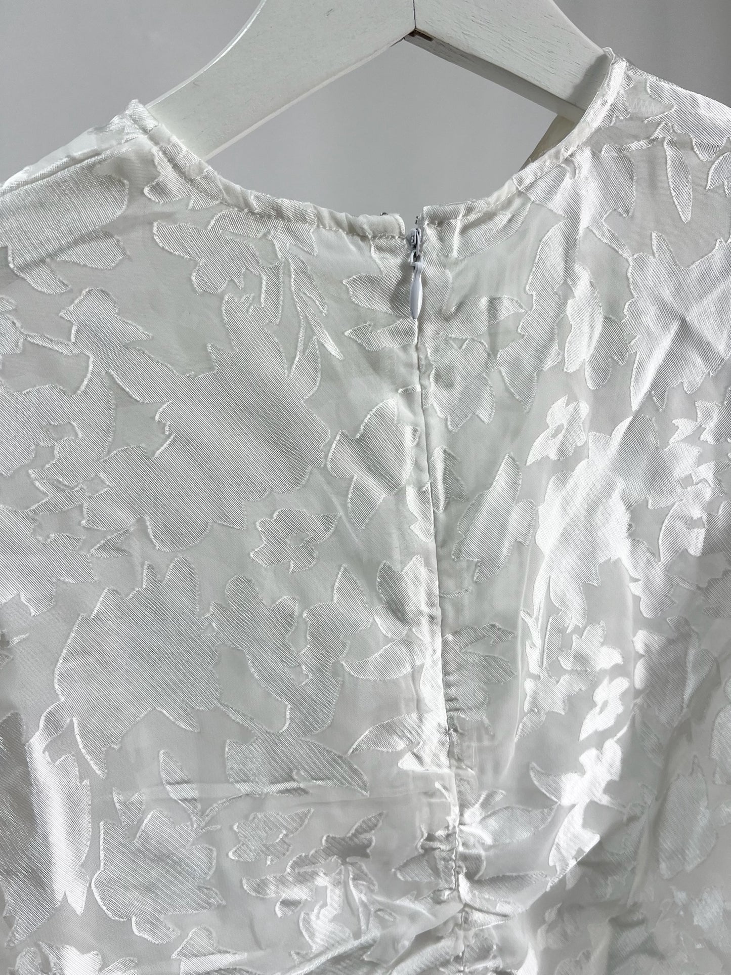 25052White Sheer Floral Top with Drawstring Detail