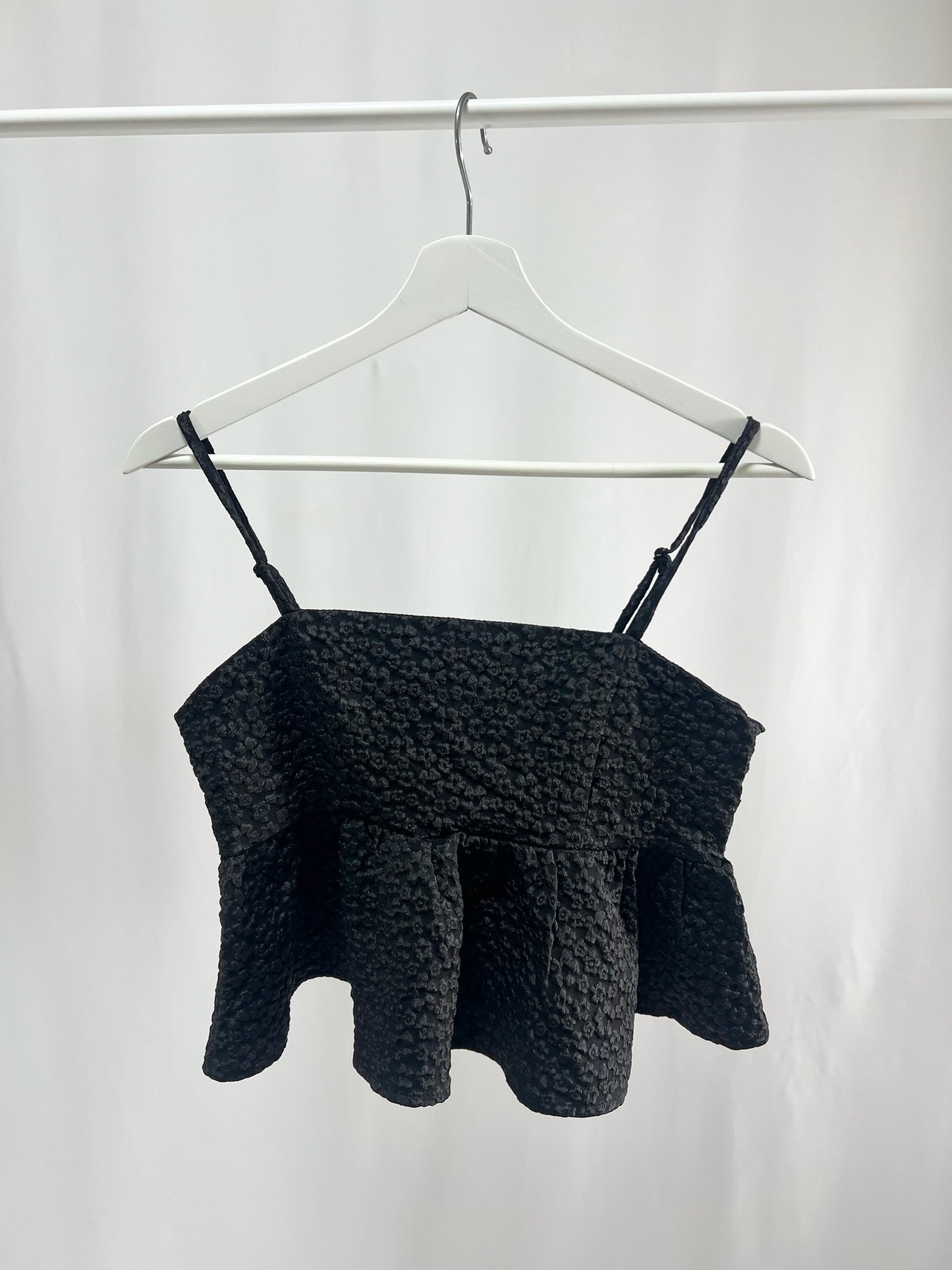 25036Textured Peplum Camisole