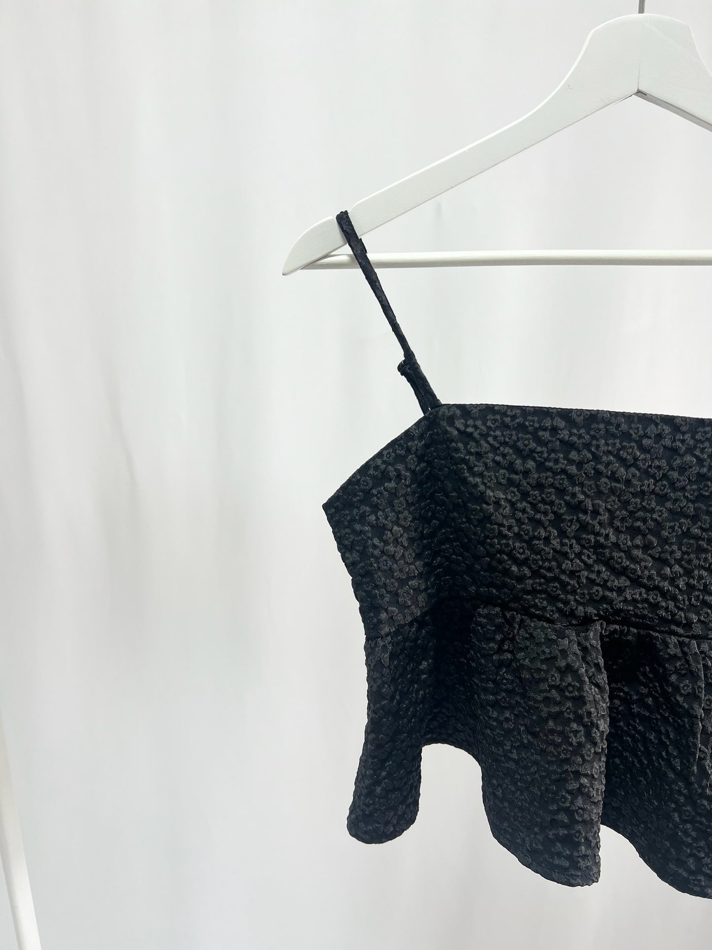 25036Textured Peplum Camisole