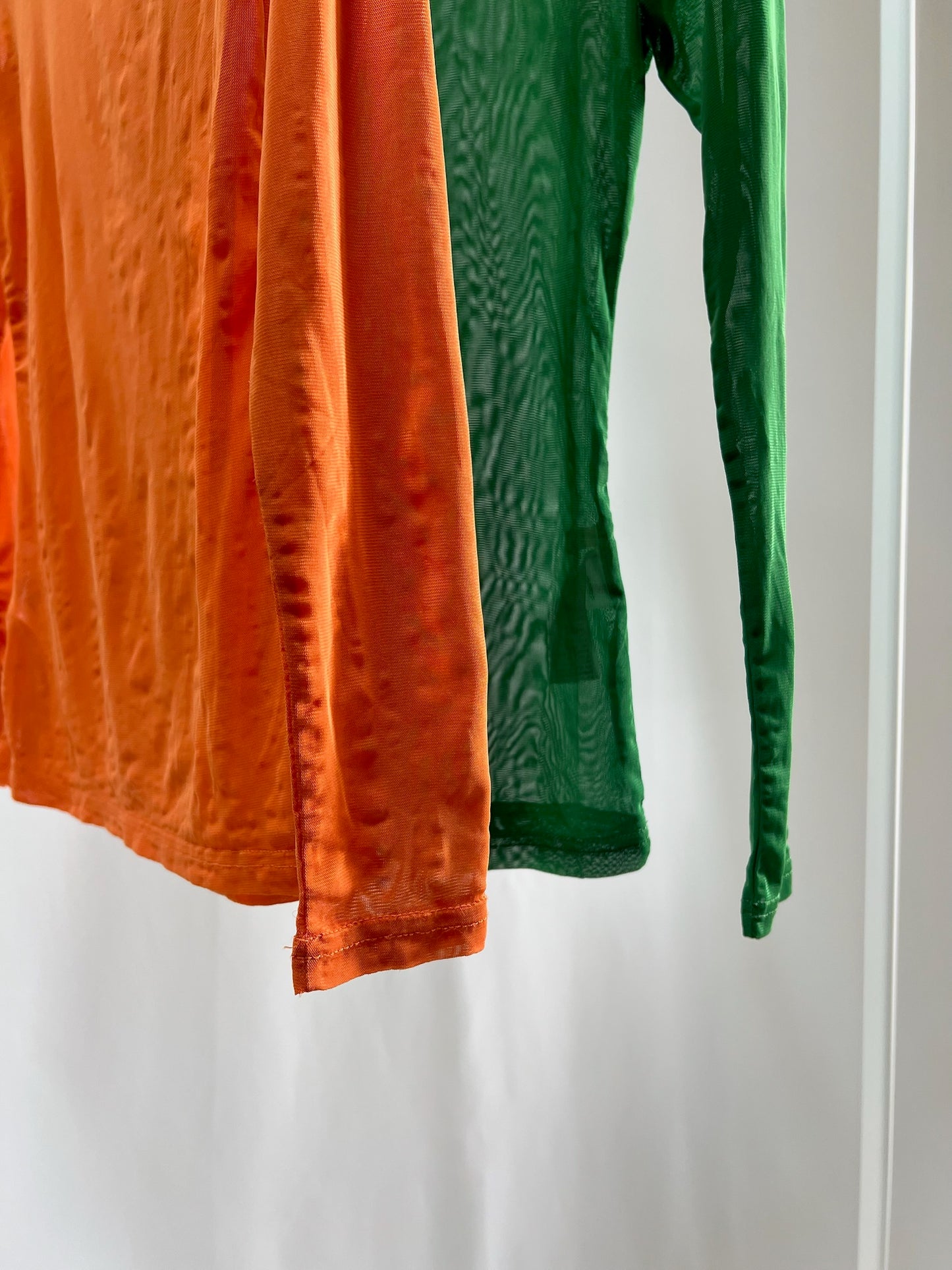 25028.29Sheer Turtleneck Color Top
