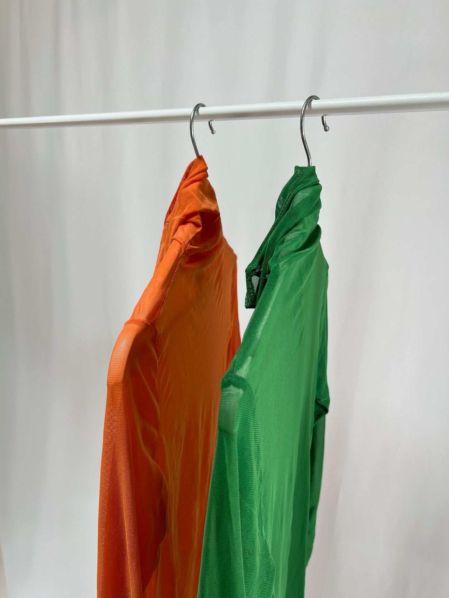 25028.29Sheer Turtleneck Color Top