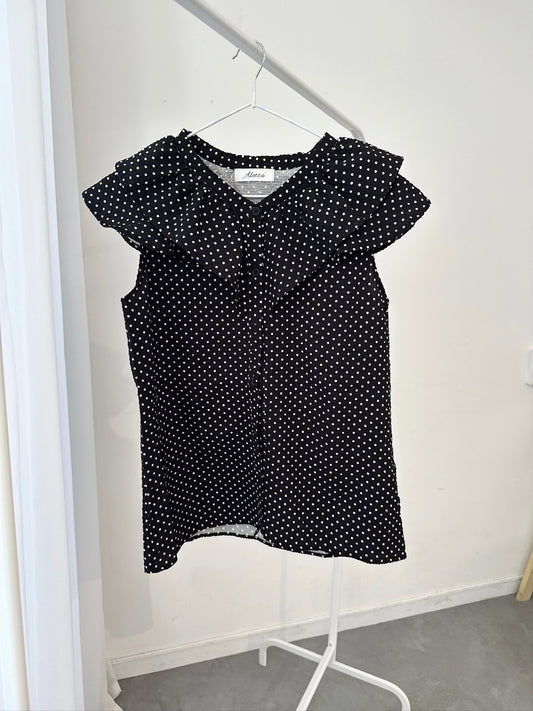 "Black Polka Dot Ruffle Blouse – Sleeveless Button-Up"